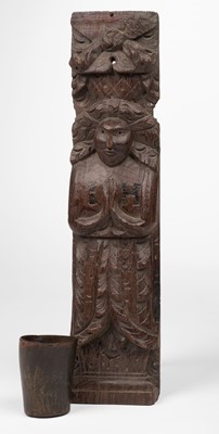 Lot 584 - Oak atlantid. A carved oak atlantid, 1st quarter 17th century, & horn beaker, both initialled IH