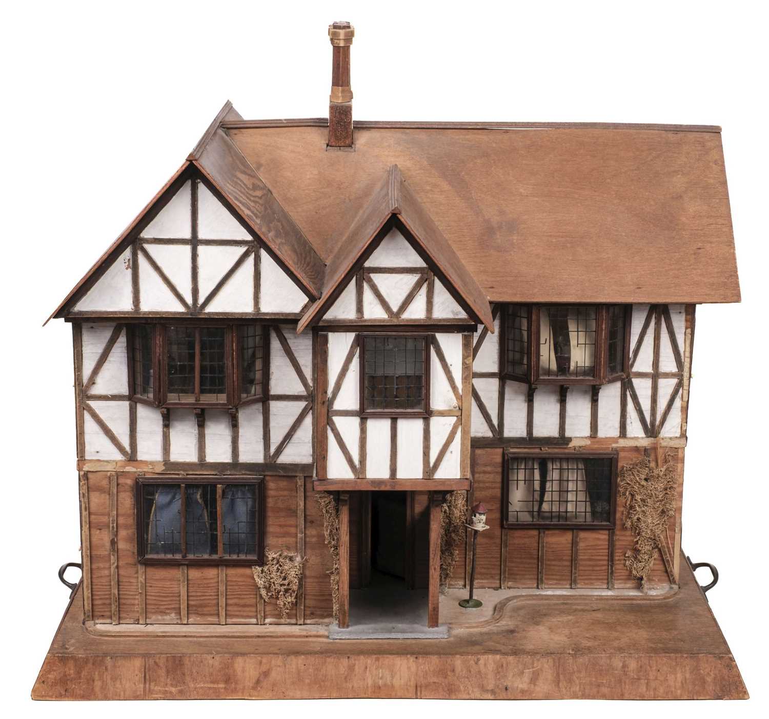 Lot 368 - Dolls' House. A bespoke half-timbered Tudor-style dolls' house, 1930s, & accessories
