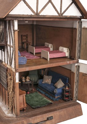 Lot 368 - Dolls' House. A bespoke half-timbered Tudor-style dolls' house, 1930s, & accessories