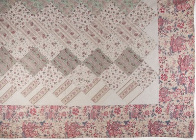 Lot 513 - Quilt. A large patchwork quilt, late 18th/early 19th century