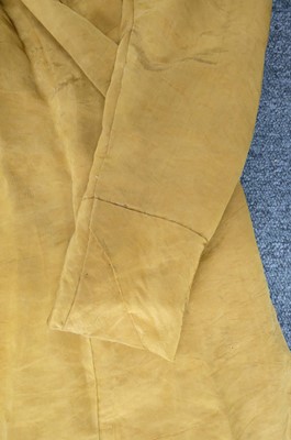 Lot 423 - Clothing. A gold moiré silk maternity gown, circa 1820s