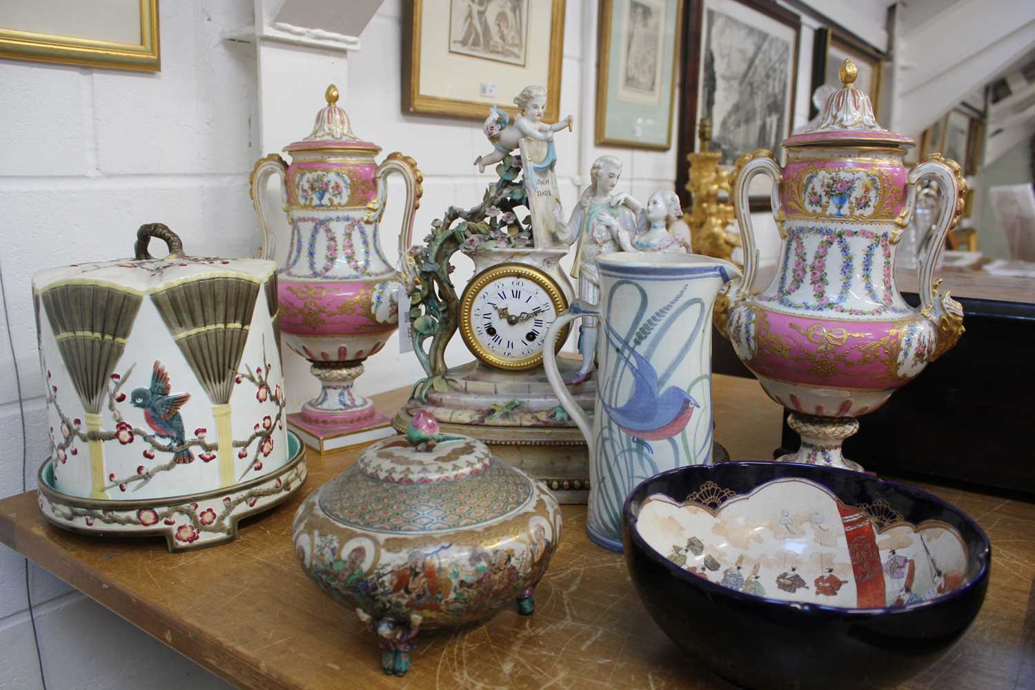 Lot 523 - Decorative ceramics. A pair of late Victorian Sevres style pink ground vases