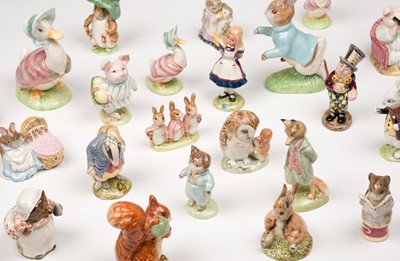 Lot 539 - Beswick. A collection of 28 Beatrix Potter figurines, and others, 1955-1993