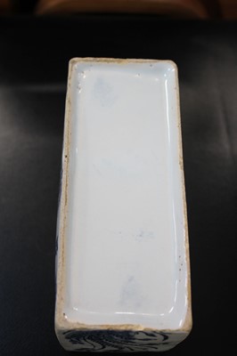 Lot 531 - Delft. An English delft blue and white flower brick, circa 1750