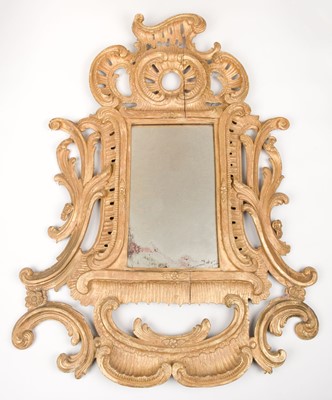 Lot 551 - Mirror. A giltwood carved mirror, probably 18th century