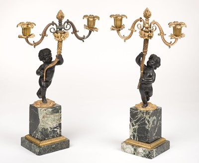 Lot 593 - Candleabra. A pair of French bronze and ormolu two-branch candleabra, 19th century