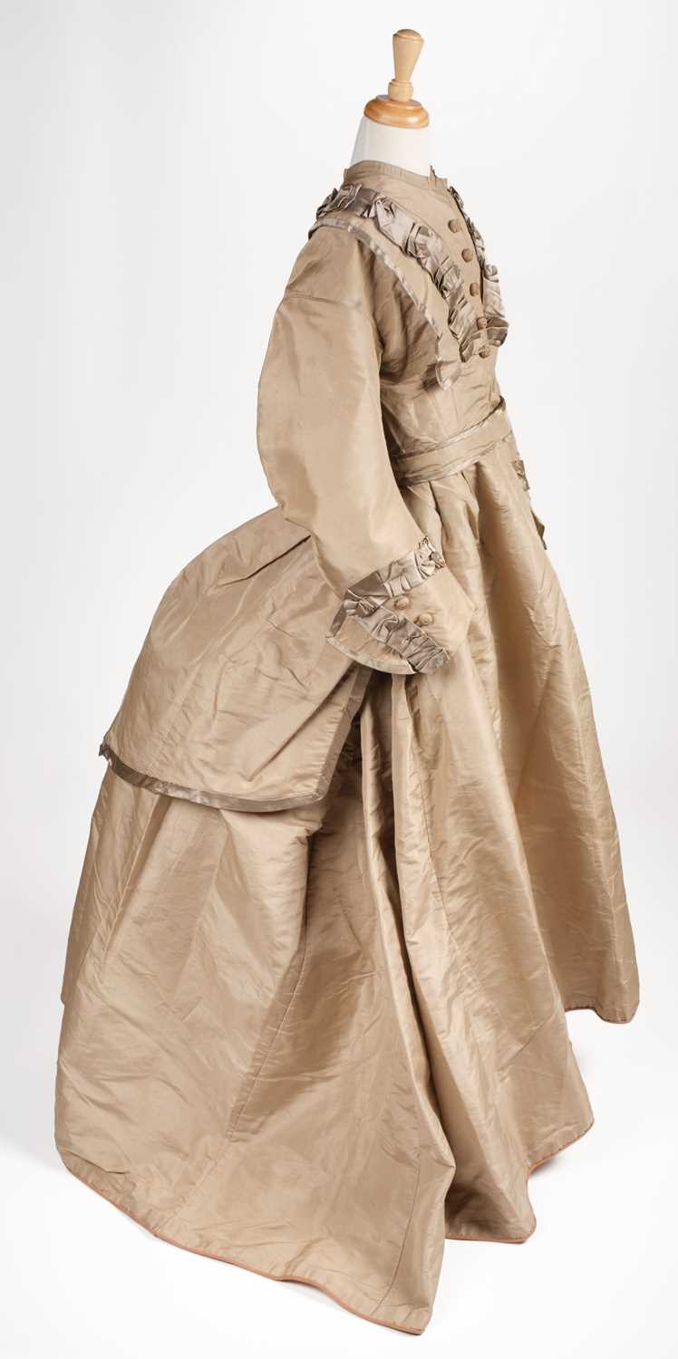 Lot 427 - Clothing. A two-piece silk gown, circa 1860s, & 5 others similar