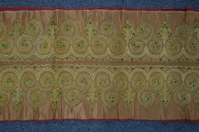 Lot 441 - Embroidery. A goldwork and beetle-wing panel, India, 19th century