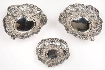 Lot 604 - Bon Bon dishes. A pair of Victorian ornate bon bon dishes by W H [?], Birmingham, 1893