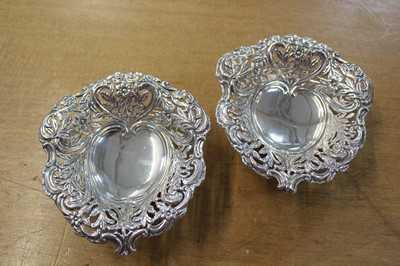 Lot 604 - Bon Bon dishes. A pair of Victorian ornate bon bon dishes by W H [?], Birmingham, 1893