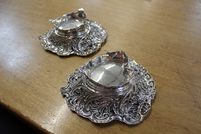 Lot 604 - Bon Bon dishes. A pair of Victorian ornate bon bon dishes by W H [?], Birmingham, 1893