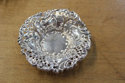 Lot 604 - Bon Bon dishes. A pair of Victorian ornate bon bon dishes by W H [?], Birmingham, 1893