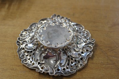 Lot 604 - Bon Bon dishes. A pair of Victorian ornate bon bon dishes by W H [?], Birmingham, 1893