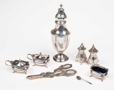 Lot 612 - Mixed silver. An Edwardian silver sugar caster by Walker and Hall, Sheffield 1908