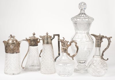 Lot 522 - Decanters. A collection of cut glass decanters and claret jugs