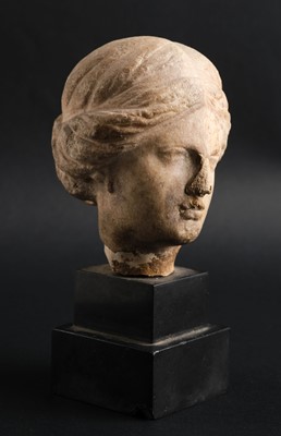 Lot 508 - Marble Head of a Young Woman, circa 2nd century B.C.