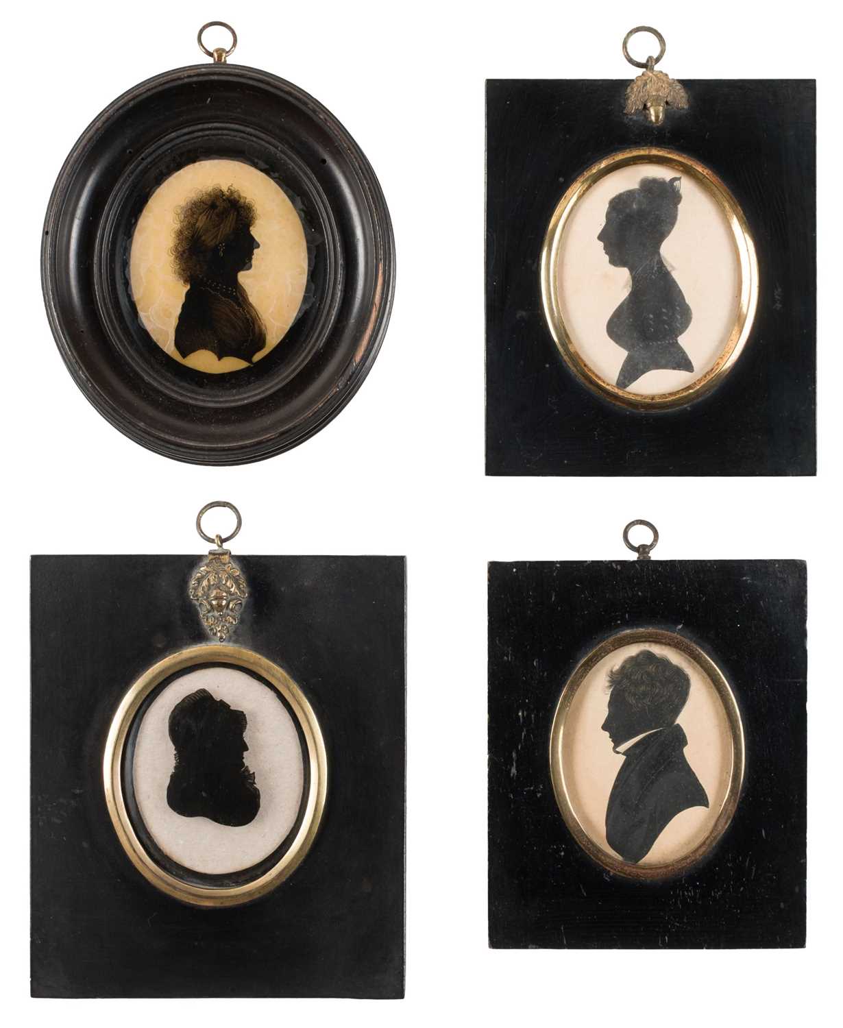 Lot 60 - Irish Silhouette Portraits. A group of 11 silhouette portraits, relating to the Crawford family, mid-19th century