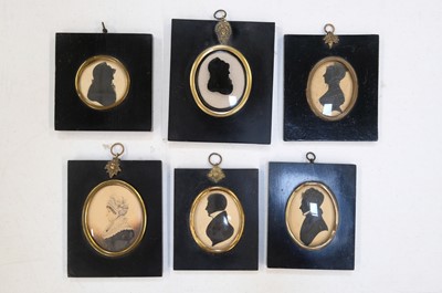 Lot 60 - Irish Silhouette Portraits. A group of 11 silhouette portraits, relating to the Crawford family, mid-19th century