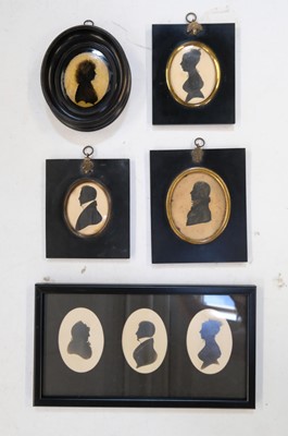 Lot 60 - Irish Silhouette Portraits. A group of 11 silhouette portraits, relating to the Crawford family, mid-19th century