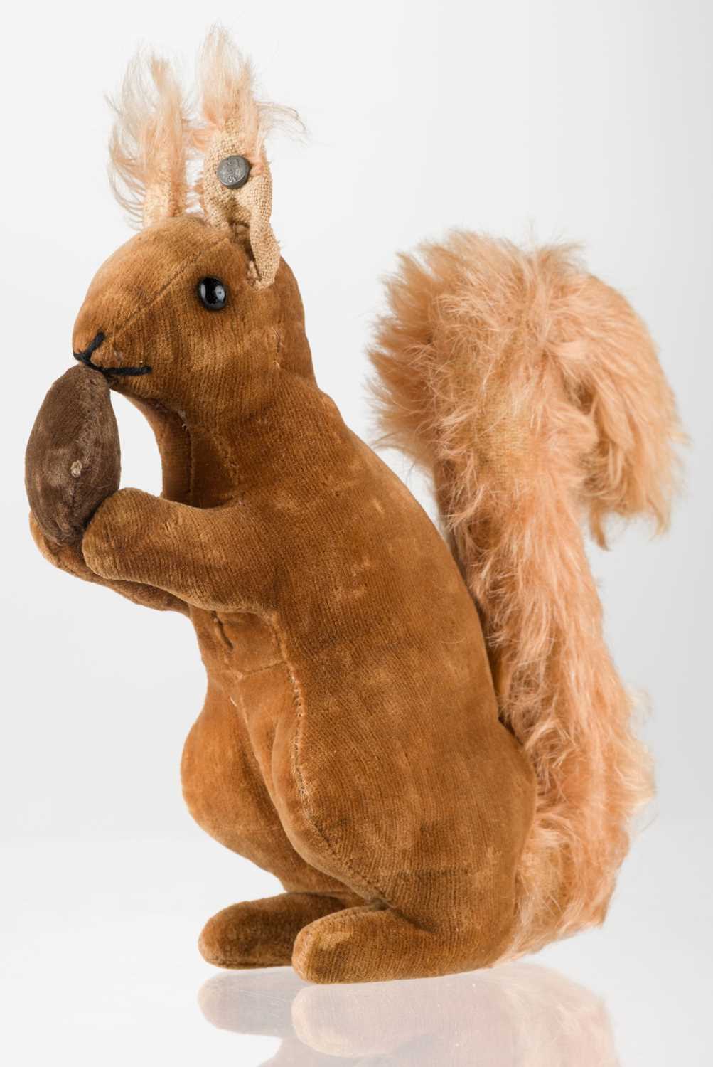 Lot 135 - Steiff. Squirrel, holding a nut, circa 1905-1920