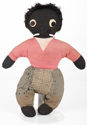 Lot 131 - Gollywog. An early 19th century gollywog, with card inscribed by Beatrix Potter, 1902