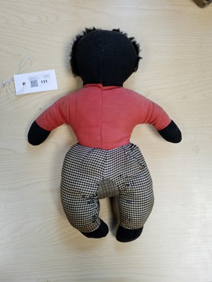 Lot 131 - Gollywog. An early 19th century gollywog, with card inscribed by Beatrix Potter, 1902
