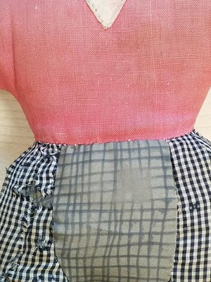 Lot 131 - Gollywog. An early 19th century gollywog, with card inscribed by Beatrix Potter, 1902