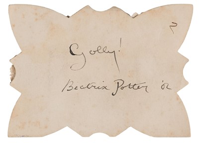 Lot 131 - Gollywog. An early 19th century gollywog, with card inscribed by Beatrix Potter, 1902