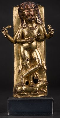 Lot 587 - Nepal. A finely cast and richly gilded bronze figure of Bhairava, the fierce manifestation of Shiva, late 17th century
