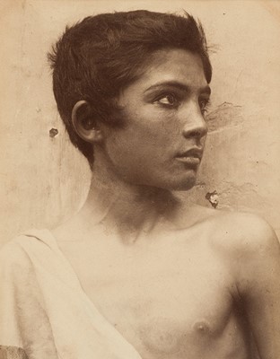 Lot 50 - Gloeden (Wilhelm von, 1856-1931). Young man wearing a toga, c. 1900