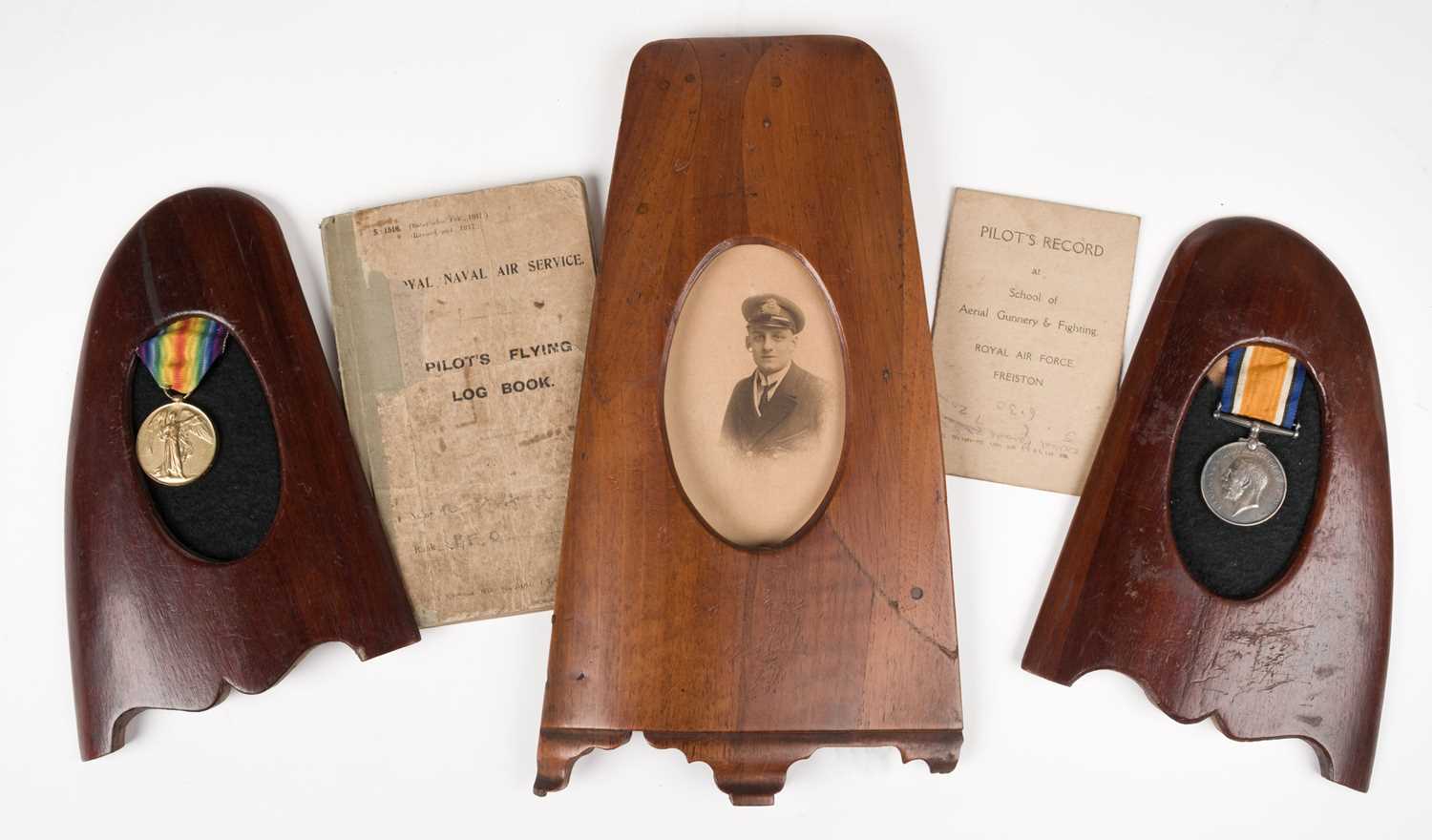 Lot 43 - RNAS Logbook. WWI Royal Naval Air Service logbook kept by Flight Officer R.A.H. Shelford