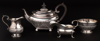 Lot 727 - Teapot. A Victorian silver bachelor's teapot, plus milk jug and sugar bowl