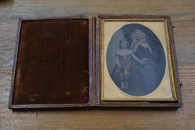 Lot 27 - Cased Images. A group of fourteen family portraits, c. 1860s