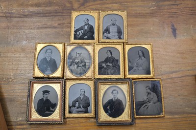 Lot 27 - Cased Images. A group of fourteen family portraits, c. 1860s