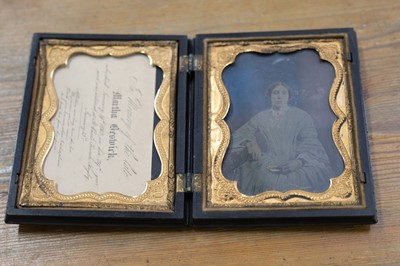 Lot 27 - Cased Images. A group of fourteen family portraits, c. 1860s