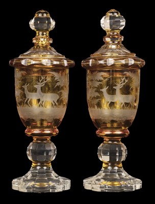 Lot 607 - Bohemian glass. A pair of Bohemian cut glass pedestal vases and cover, 19th century