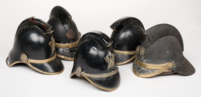 Lot 183 - Fire Fighting. A collection of British fireman's helmets, 19th century