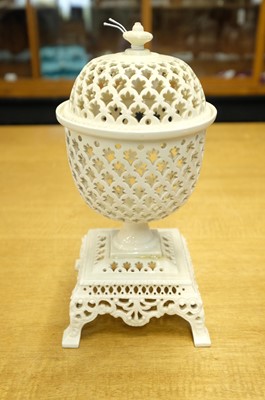 Lot 598 - Leeds Pottery. A Leeds pierced creamware pedestal urn with lid