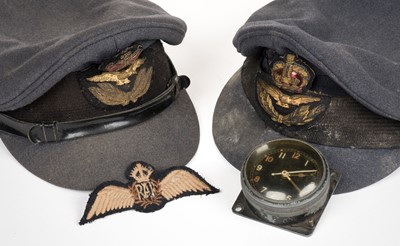 Lot 147 - RAF apparel. A WWII RAF service dress hat and related items