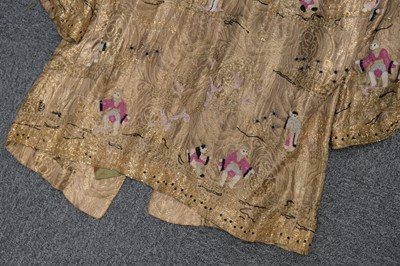 Lot 457 - Chinoiserie. A beaded gold lamé coat, 1920s