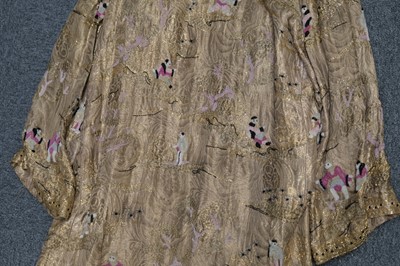 Lot 457 - Chinoiserie. A beaded gold lamé coat, 1920s