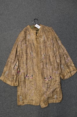 Lot 457 - Chinoiserie. A beaded gold lamé coat, 1920s