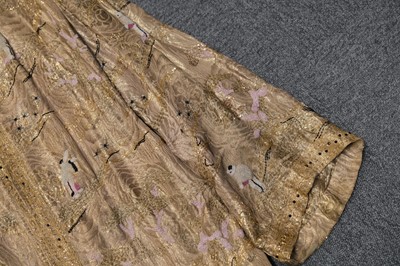 Lot 457 - Chinoiserie. A beaded gold lamé coat, 1920s