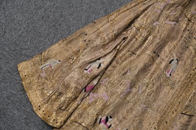 Lot 457 - Chinoiserie. A beaded gold lamé coat, 1920s