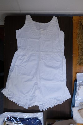 Lot 449 - Children's Clothing. A hollie point lace baby bonnet, late 18th century, & other garments