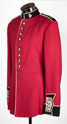 Lot 283 - Irish Guards. An E.II.R. Guardsman's scarlet cloth tunic of the Irish Guards and other tunics