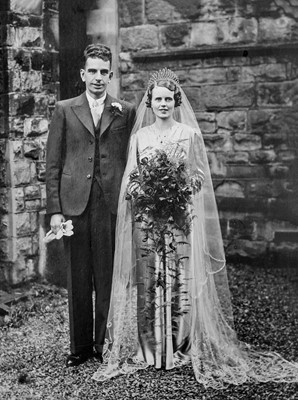 Lot 462 - Clothing. A gold satin wedding dress worn by Olive Mary Bankes, 1938