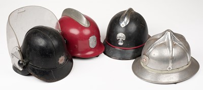 Lot 177 - Fire Fighting. A collection of World Fireman's helmets