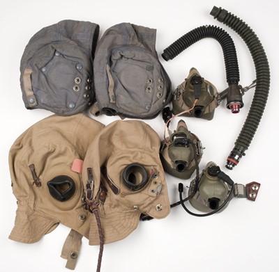 Lot 65 - Flying helmets. Various summer-weight flying helmets, plus six green rubber oxygen masks