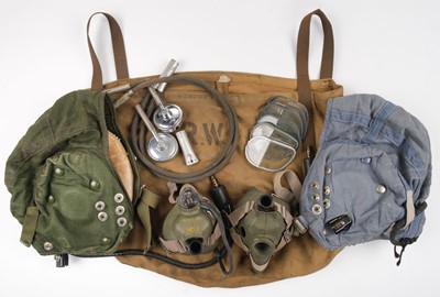 Lot 63 - Flying equipment. Flying helmets, Gosport tubes, rubber oxygen masks, bakelite bell plugs
